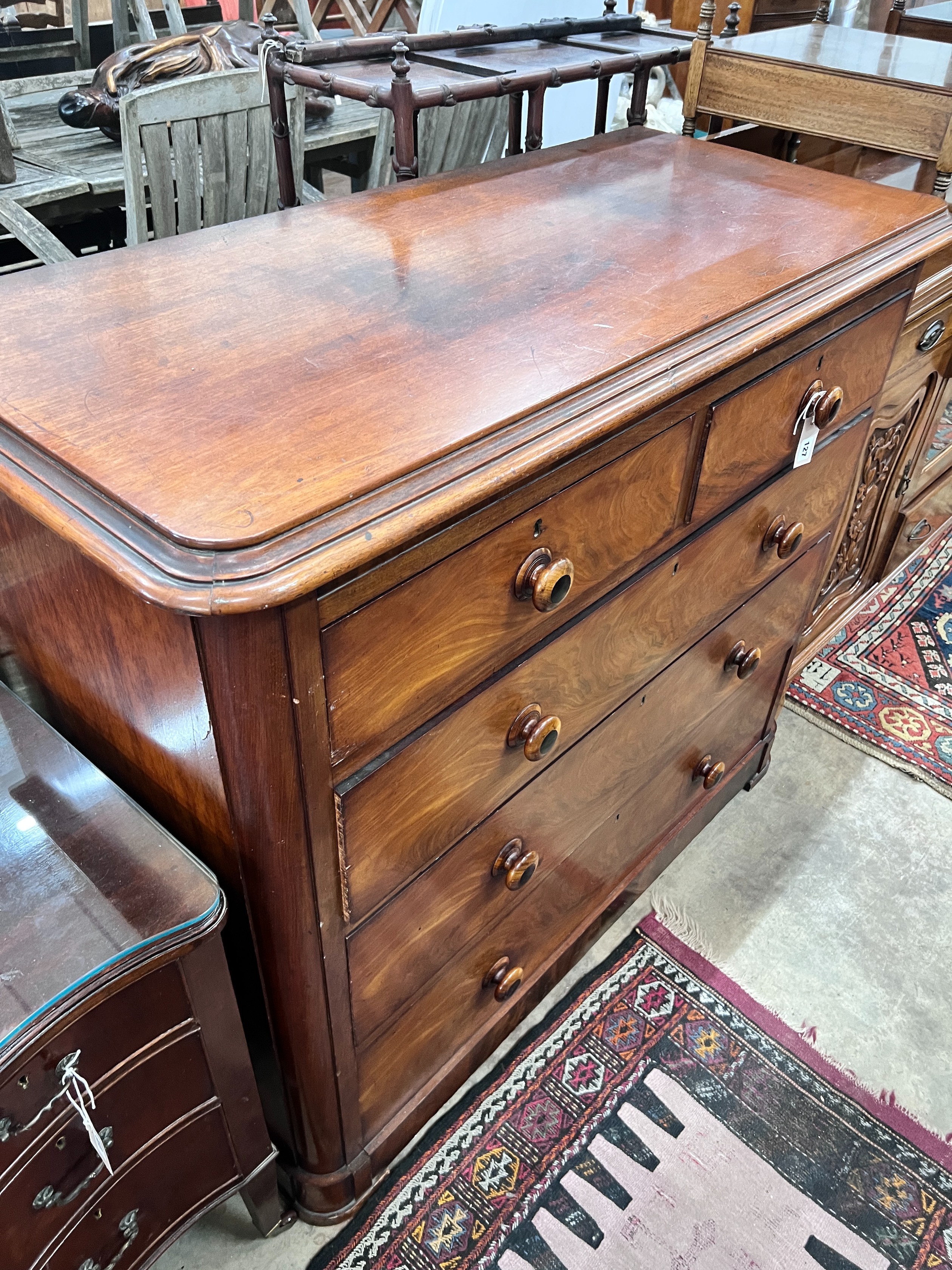 A mahogany chest of drawers, width 130cm, depth 59cm, height 112cm *Please note the sale commences at 9am.
